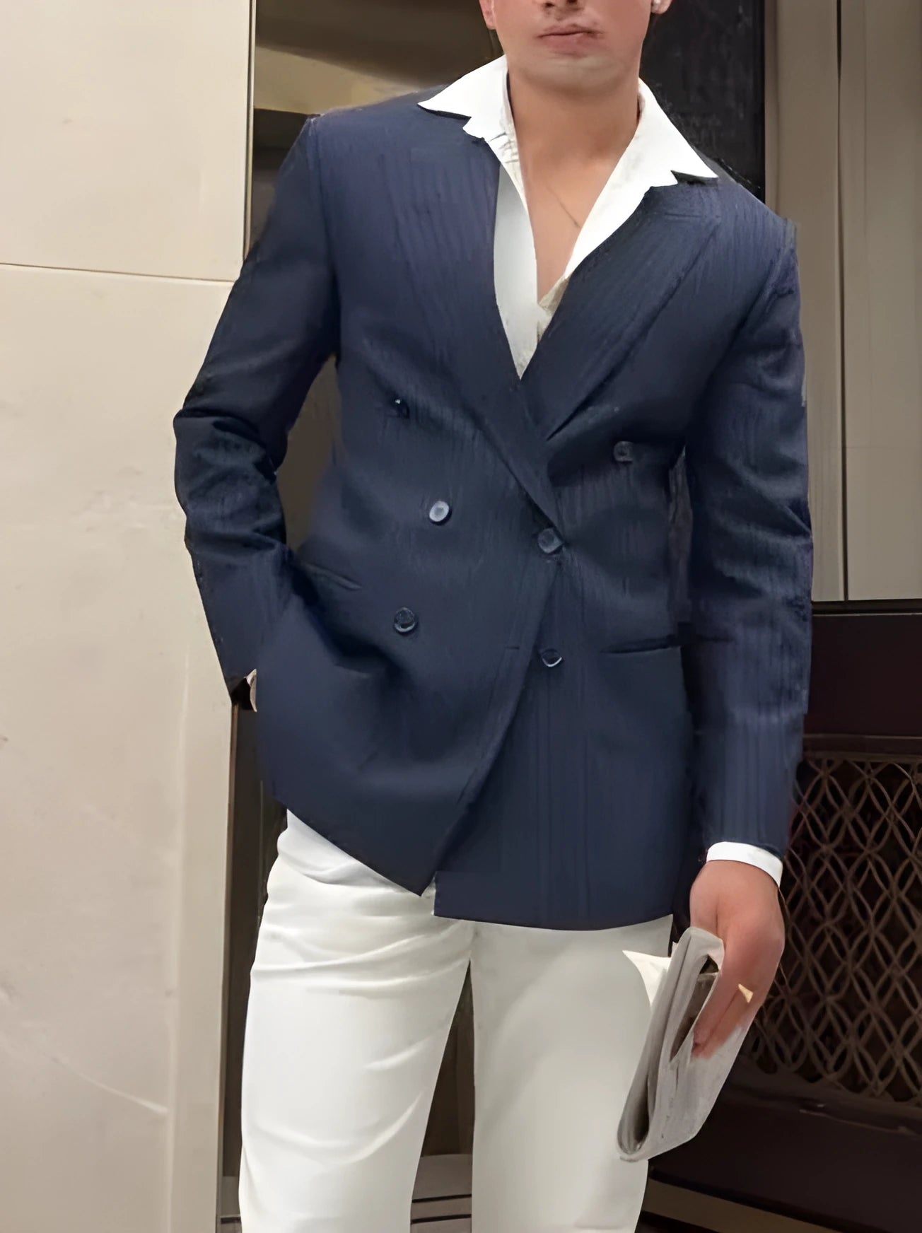 Men's striped double-breasted polyester blazer shown in regular fit for daily wear