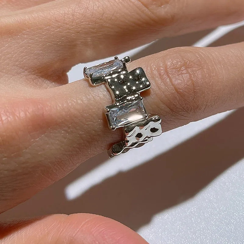Geometric cross zircon open ring in silver tone with three-dimensional decoration