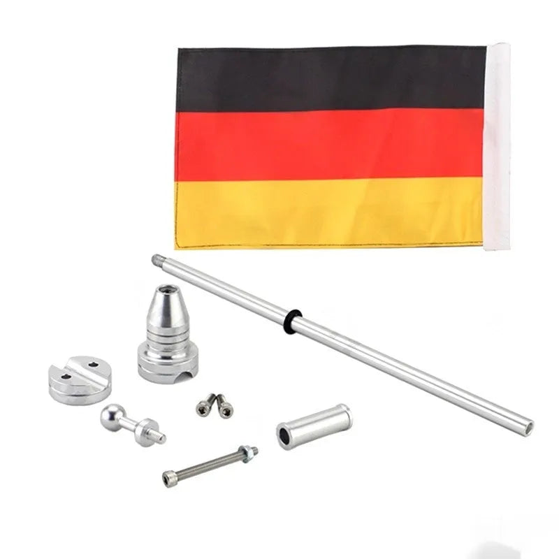 Motorcycle luggage rack flagpole accessory in black and silver finishes mounted on tail box