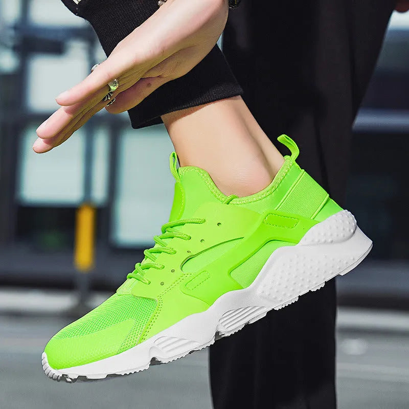 Men's low-top casual shoes in fluorescent colour with mesh upper and cross shoulder straps