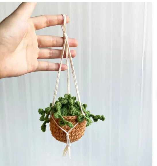 Green and white knitted wool car plant decoration with 8cm base and 25cm hanging rope