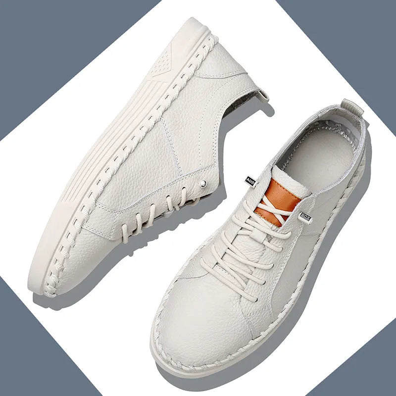 Men's beige and black cowhide leather sneakers with round toe and mesh lining.