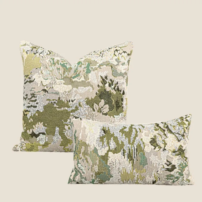 Green wool blend cushion cover with a spring flowers botanical pattern, shown in square and lumbar sizes.