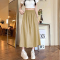 Camel-colour women's wide-leg cropped skirt with elastic waist and quilting details