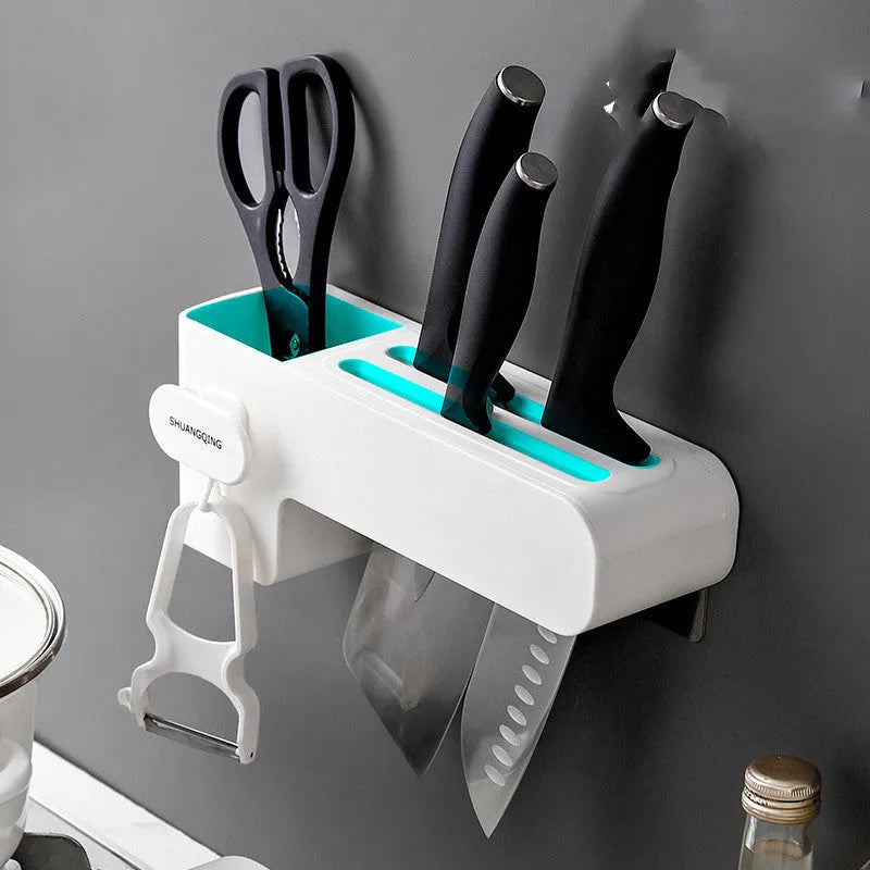 White plastic kitchen knife rack organiser with modern simple design on a countertop.