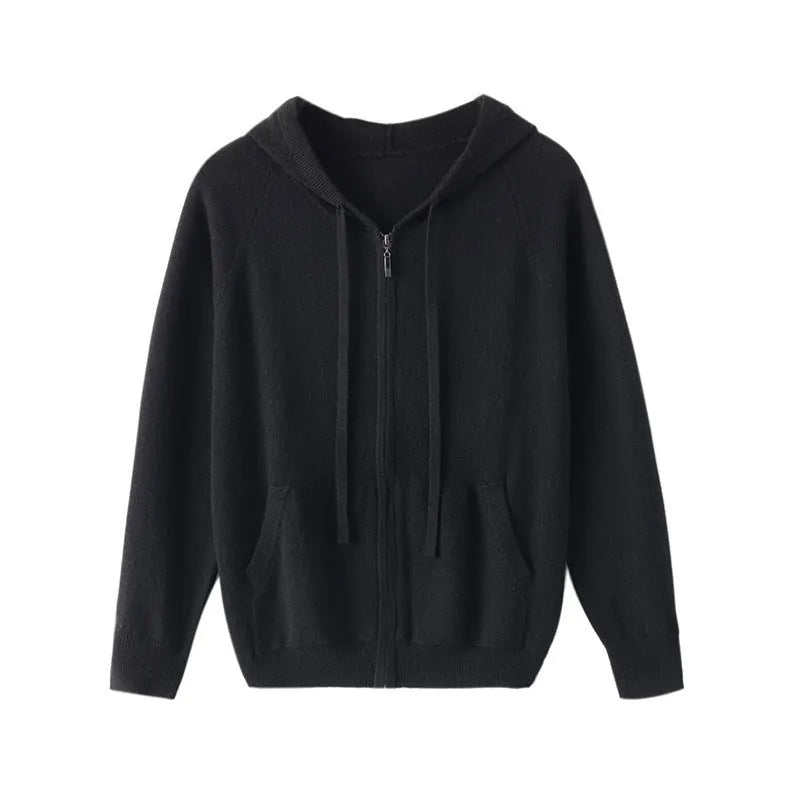 Man wearing a haze blue hooded zip-front cashmere knit cardigan in a casual setting.