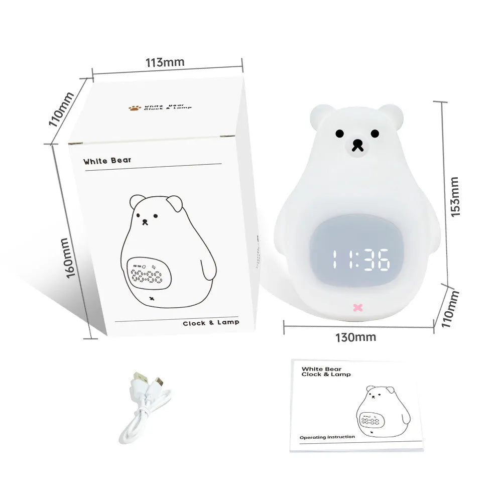 White cartoon bear silicone night light with remote control on a surface.