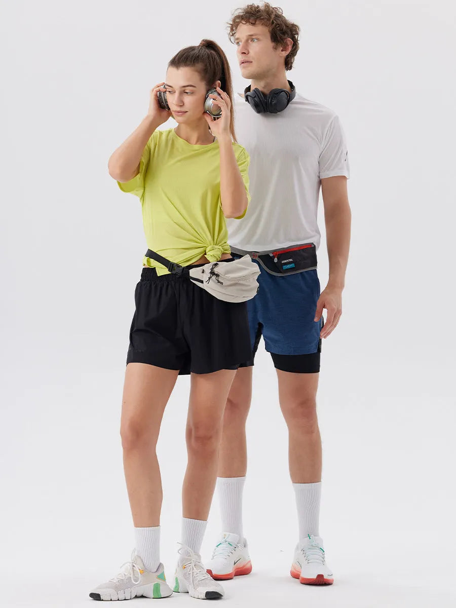 Men's straight-leg nylon sports shorts with side slits in turmeric yellow, night blue, and black.