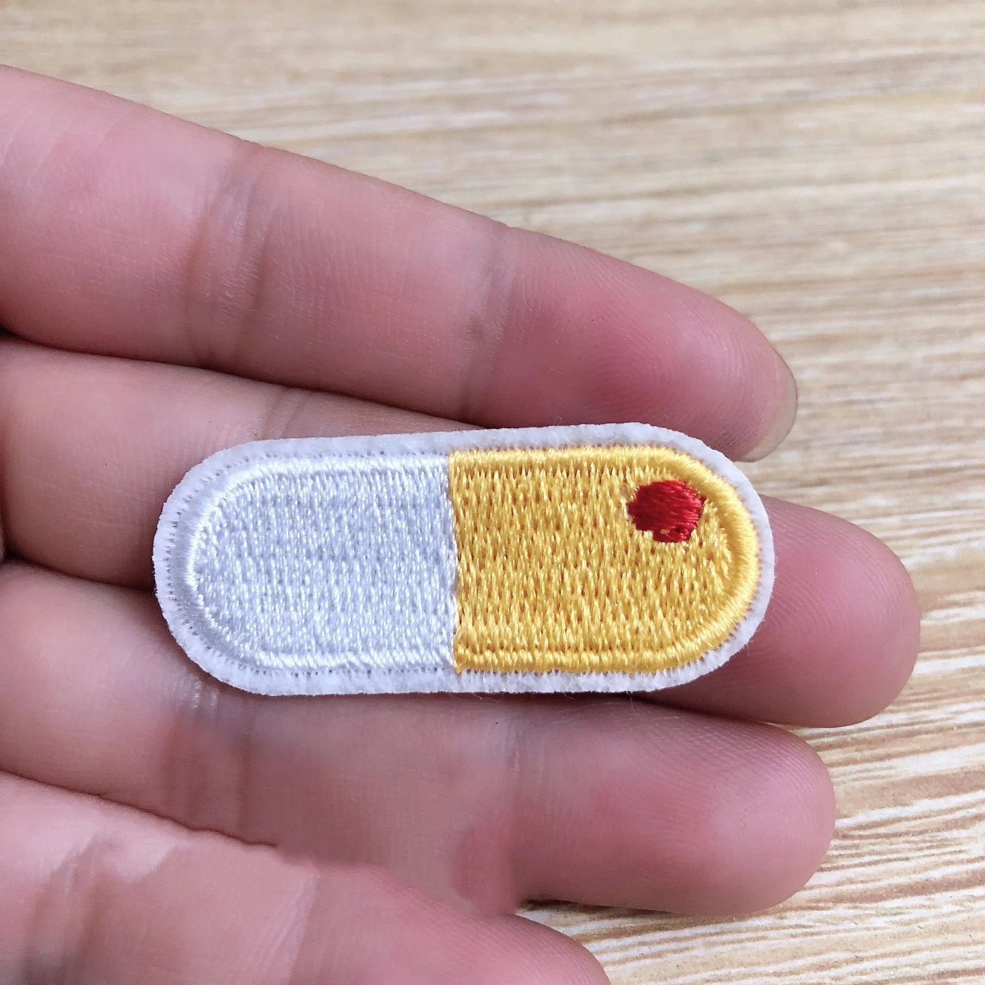Ten embroidered fabric patch badges with detailed lace craft embroidery designs