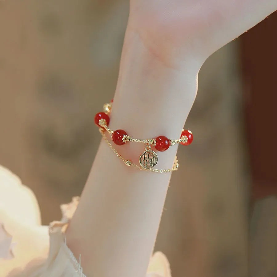 Women's double-layer alloy bracelet with a red agate blessing card charm and horse motif
