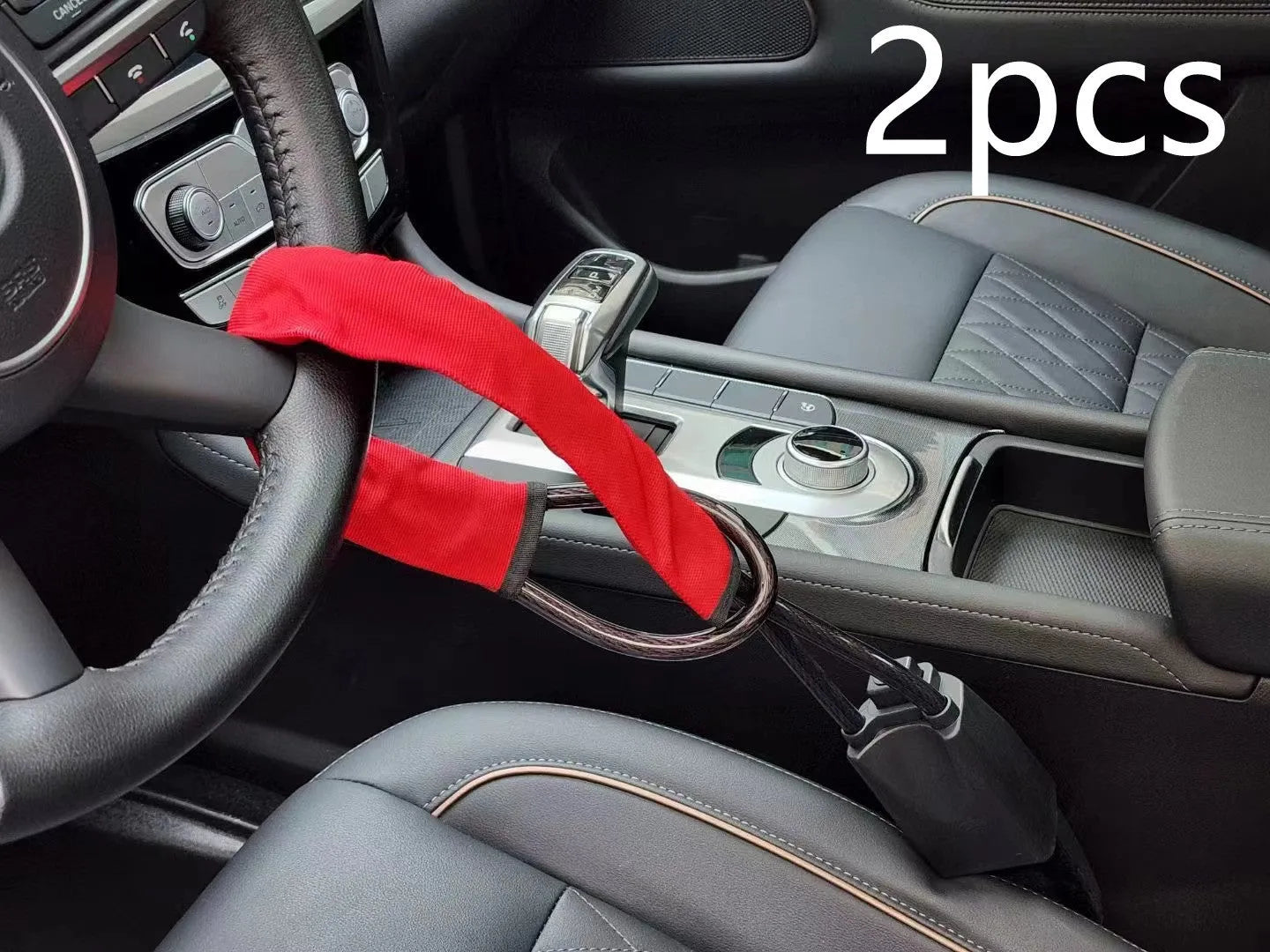 Red iron wire rope car steering wheel lock with key for General Motors vehicles.