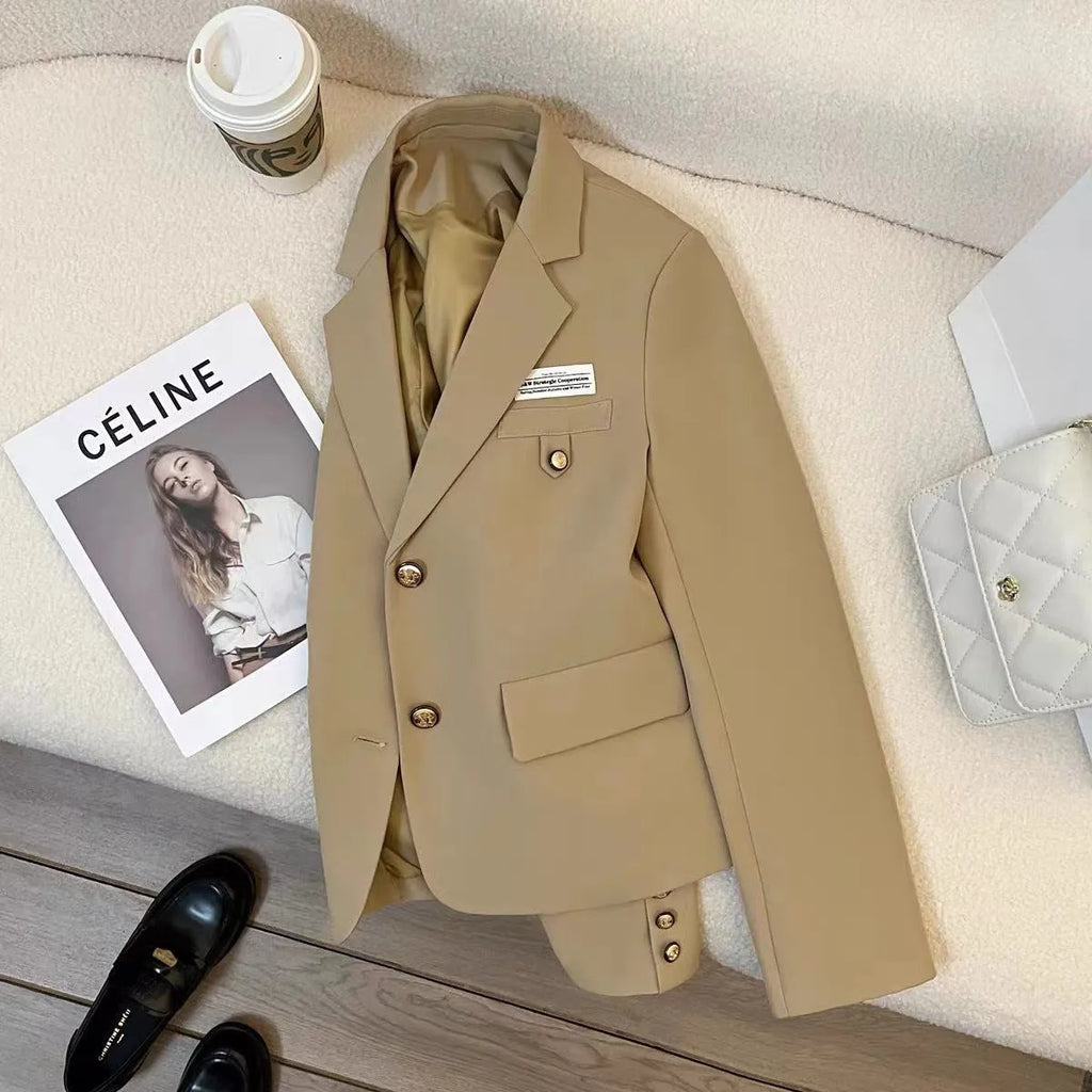 Black women's loose-fit polyester suit coat with long sleeves and pockets