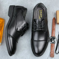 Men's black formal lace-up leather shoes with stitching detail, shown on a white background.