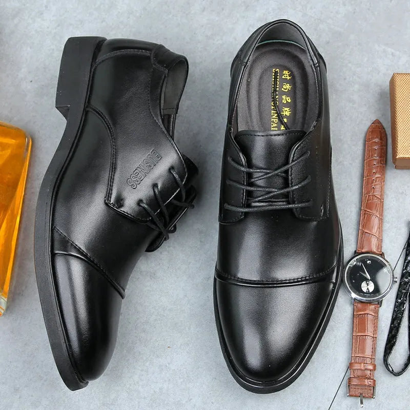 Men's black formal lace-up leather shoes with stitching detail, shown on a white background.