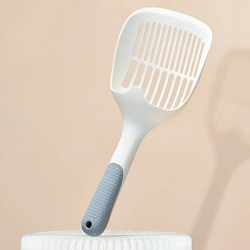 White plastic cat litter scoop with base tray measuring 29.5cm