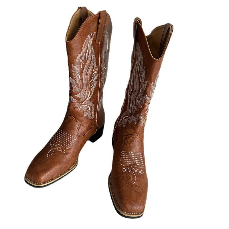 Brown women's mid-calf Martin boots with embroidery and a square low heel.