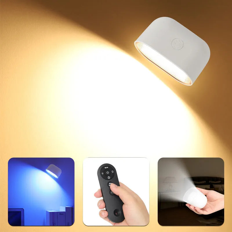 Modern remote-controlled magnetic wall lamp in white, showing adhesive mount and rotating head.
