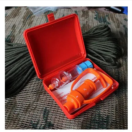 Orange portable venom extractor suction device first aid kit with pump, two suction cups, and accessories.