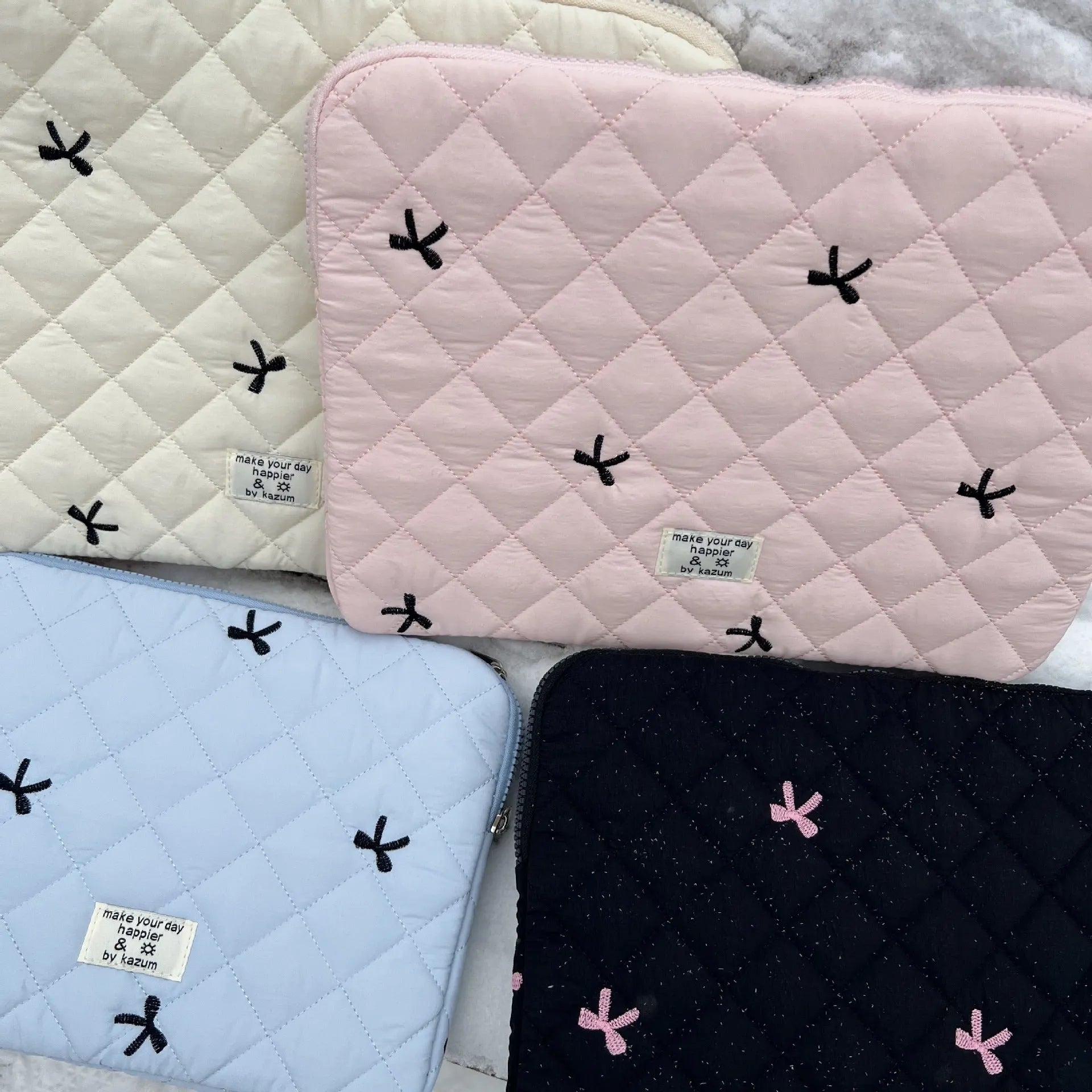 Nylon laptop storage bag with embroidered rhombus bow design in multiple colour options