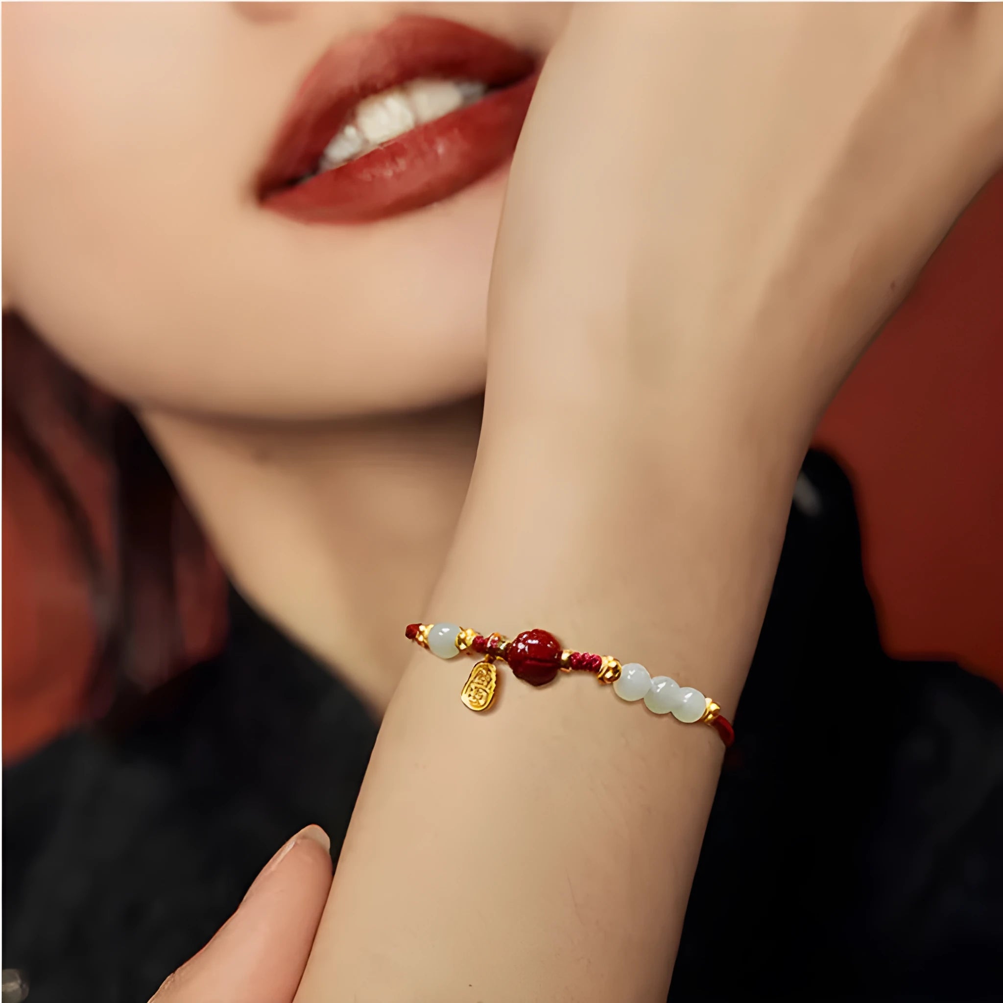 Women's adjustable Hetian jade and cinnabar red rope bracelet with 925 silver clasp