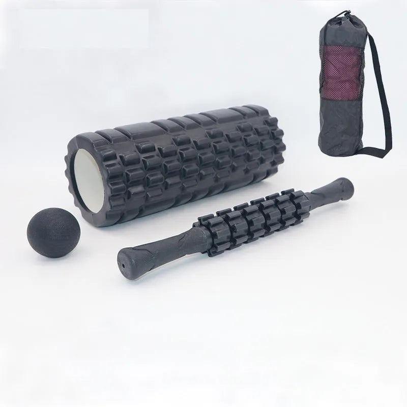 Black foam roller massage bar measuring 33cm with PVC grip pieces