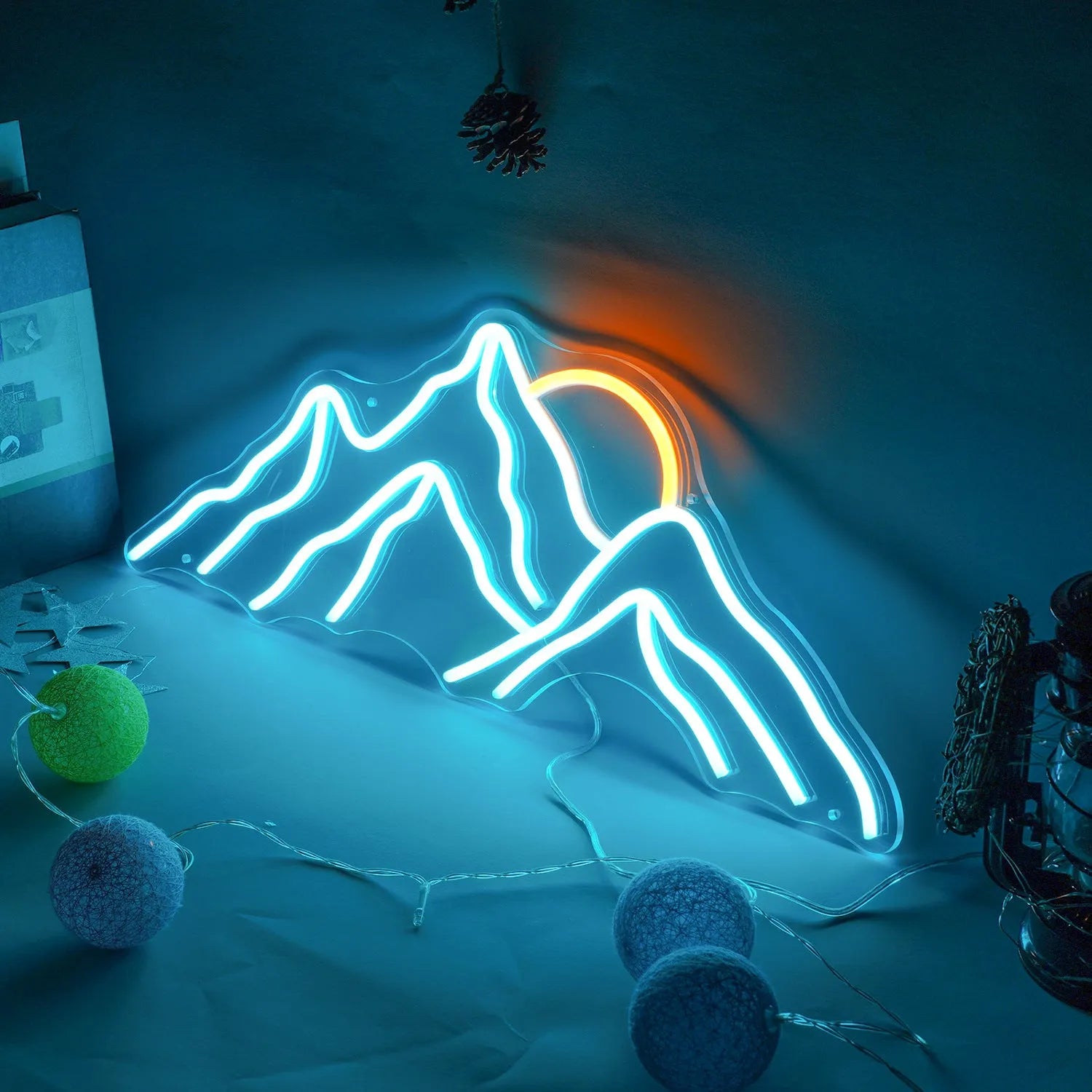 Mountain shape acrylic LED neon light with sunrise colour effect on a wall
