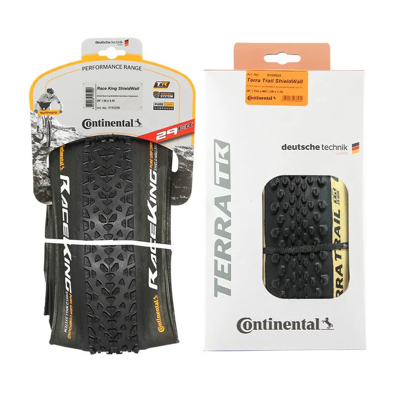 Mountain bike tyre showing tread pattern, available in 26, 27.5 and 29-inch sizes with folding or wire bead.