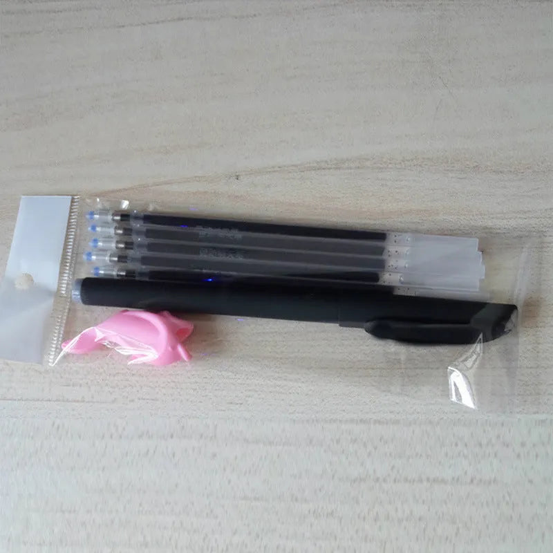 Automatic fade and disappear pen set showing pen holder and eight refill cartridges