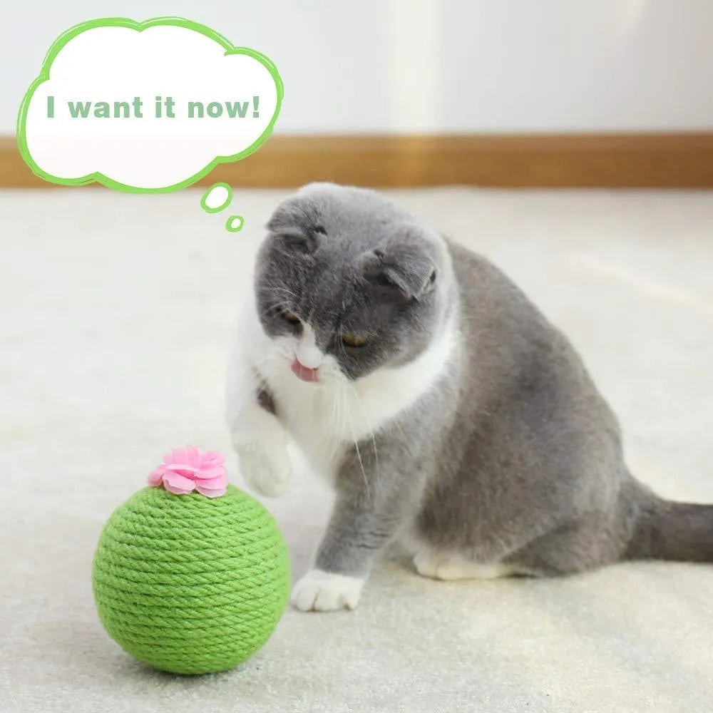 Green interactive cat toy with sisal scratcher and tumbler ball on tree tower base for indoor play