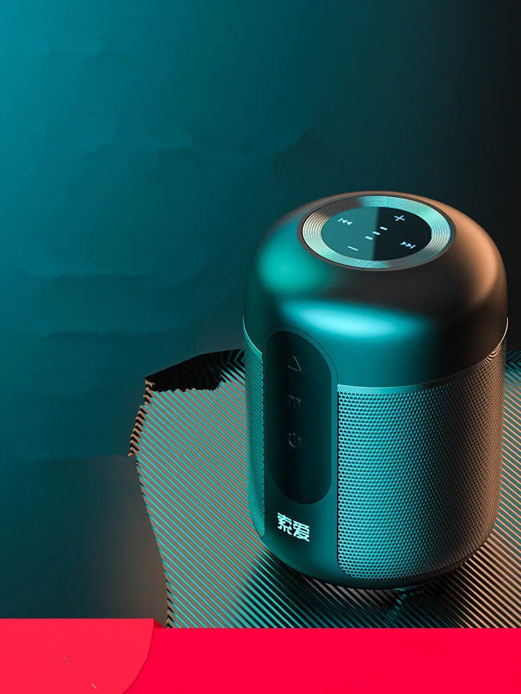 Black portable Bluetooth speaker showing front grill and controls, with scale indicating compact 72mm by 99mm size