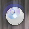 Compact automatic sweeping robot with ABS body on a hardwood floor.