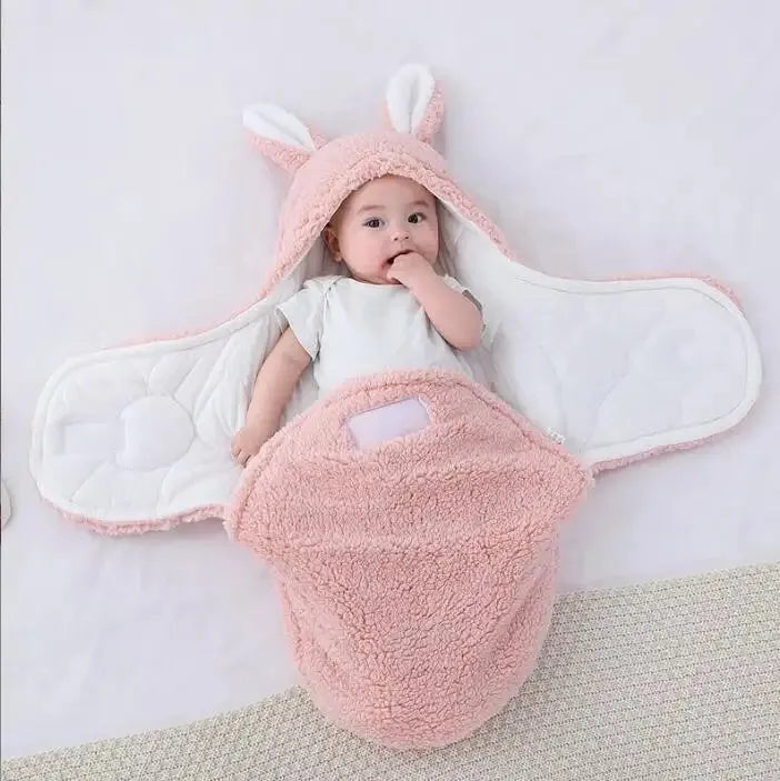 Adjustable baby sleeping bag swaddle blanket showing velcro wings and leg positioner in blue colour
