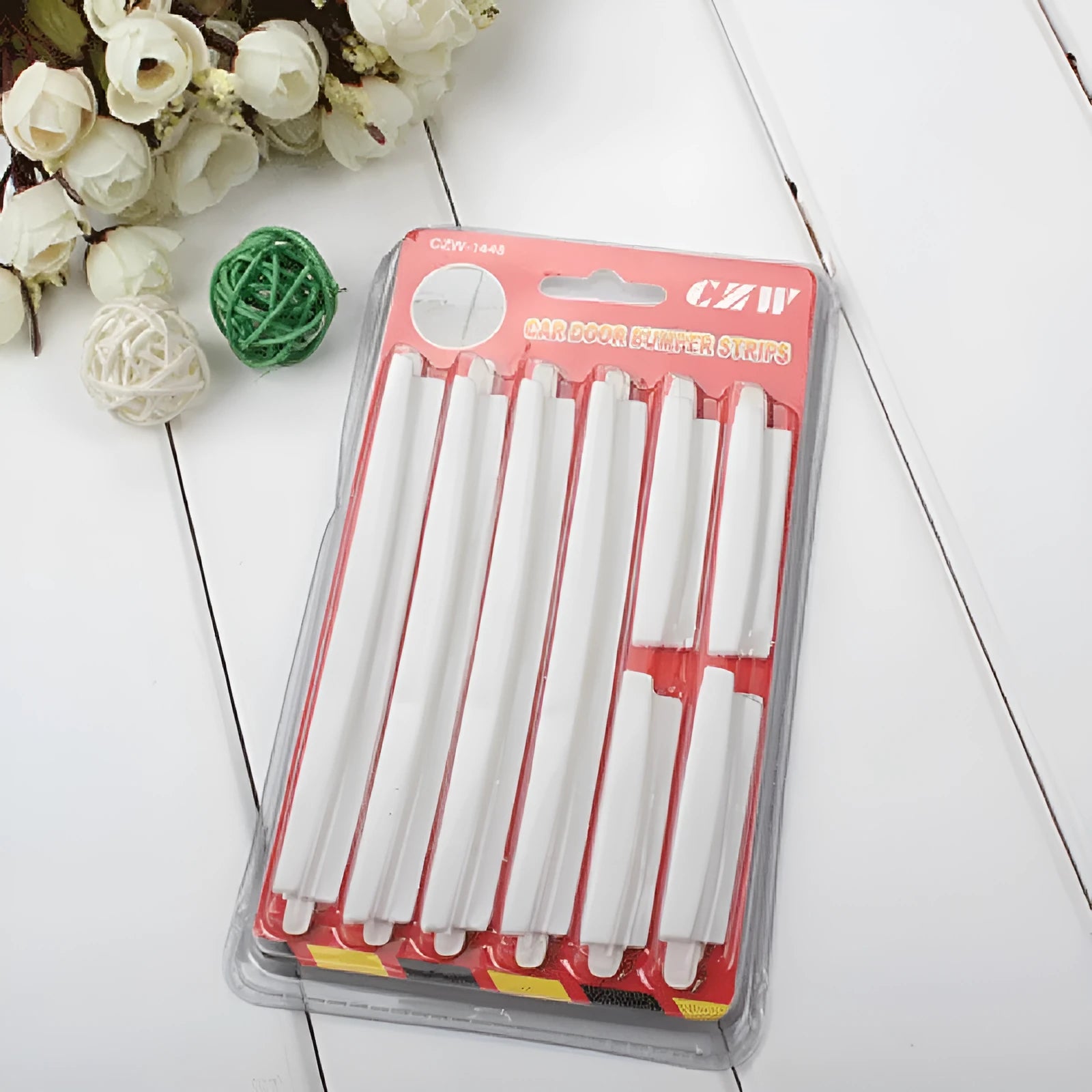 White plastic car door side bumper strip anti-collision protection set.