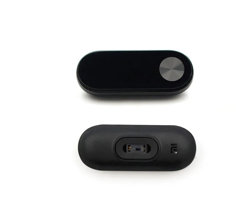 Xiaomi Mi Band 2 black smartband with OLED display on adjustable grey wrist strap.