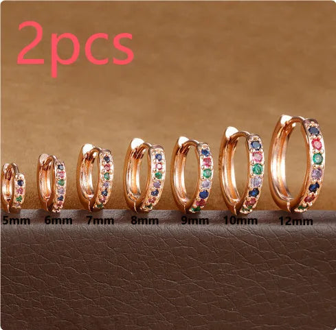 Geometric perforated stud earrings with circle zircon decoration in gold, rose gold and silver colours