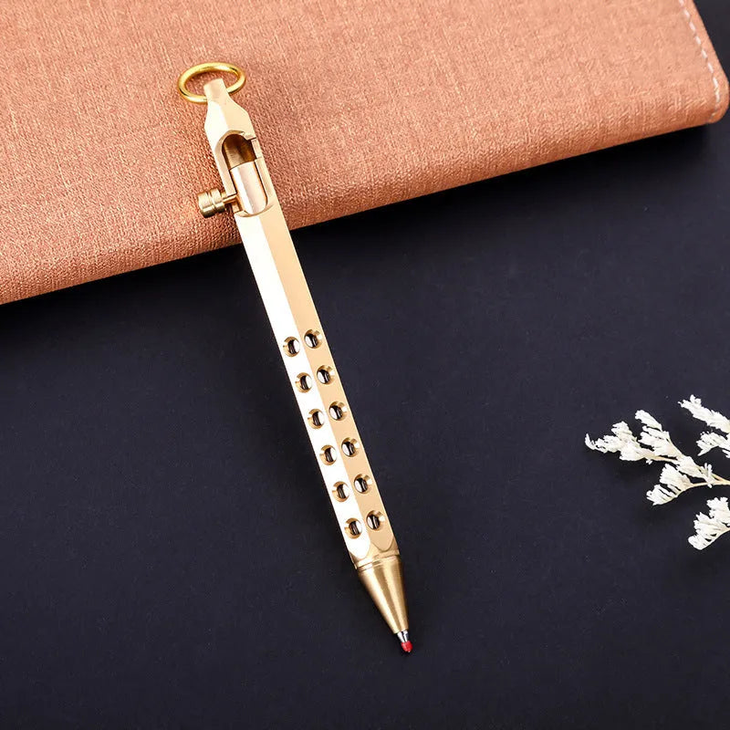 Brass hexagonal roller pen with six-angle barrel showing 0.5mm tip