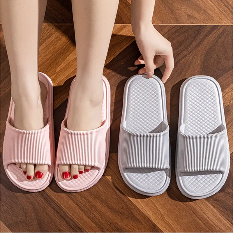 Pair of solid colour rhombus striped non-slip EVA foam indoor slippers