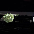 Jasmine car perfume gypsum ornament measuring 5 by 4.5cm with essential oil bottle