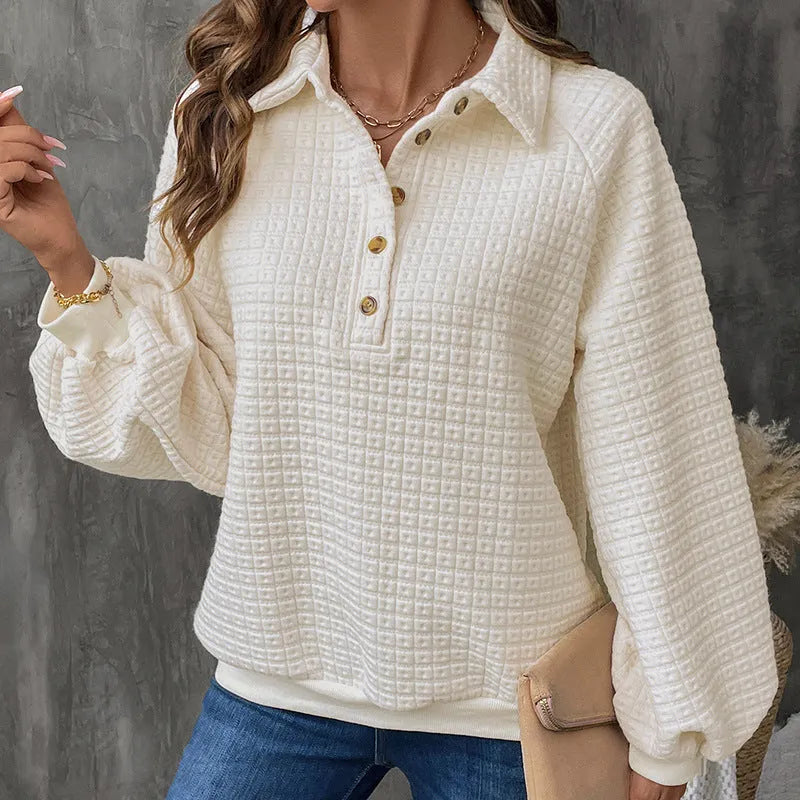 Women's milky white polo collar thickened pullover sweater on a hanger.