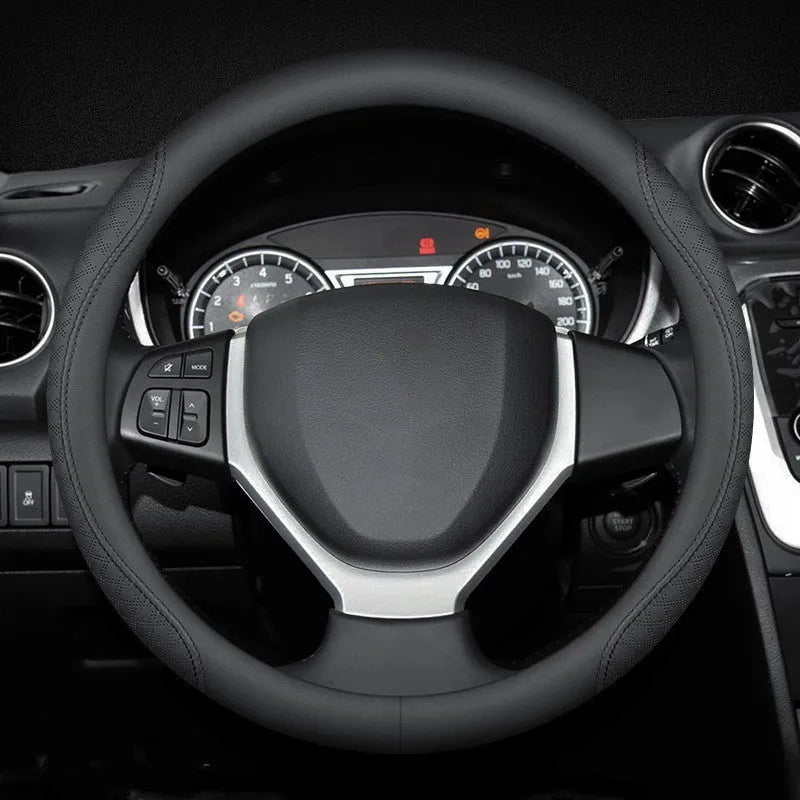 Black steering wheel cover with two-colour stitching, showing napa leather texture and a 38cm diameter.