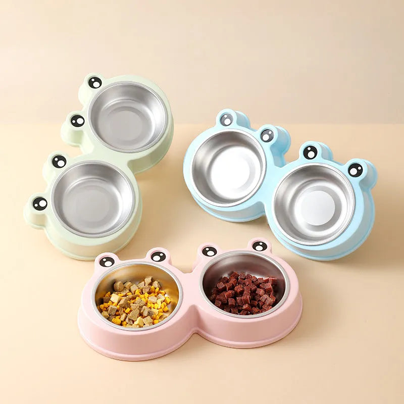 Stainless steel pet double bowl with frog design for cat and dog food and water.