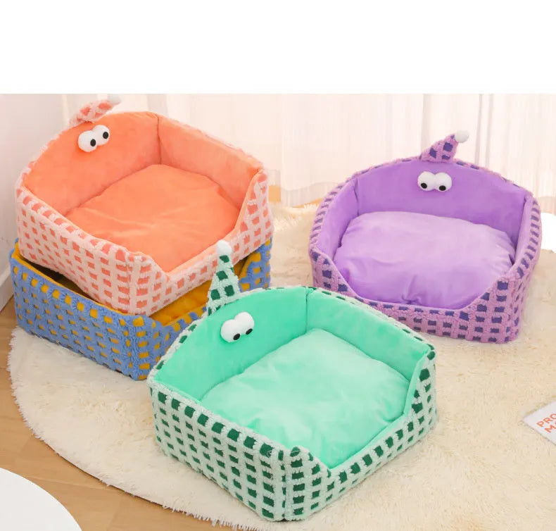 Green triangular cat bed with a thick sponge pad and removable fabric cover.