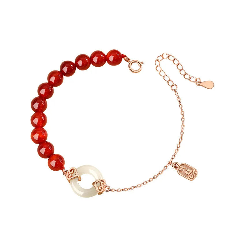 Sterling silver 925 bracelet with a peace buckle charm, xiangyun designs, and a fu character.