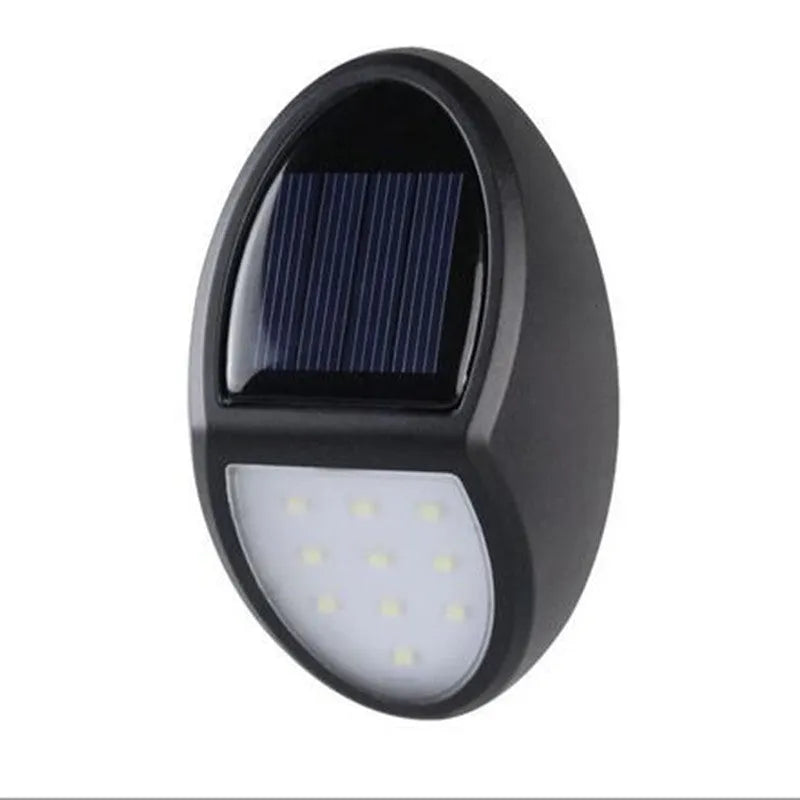Black LED solar wall light with solar panel showing 75mm x 120mm dimensions