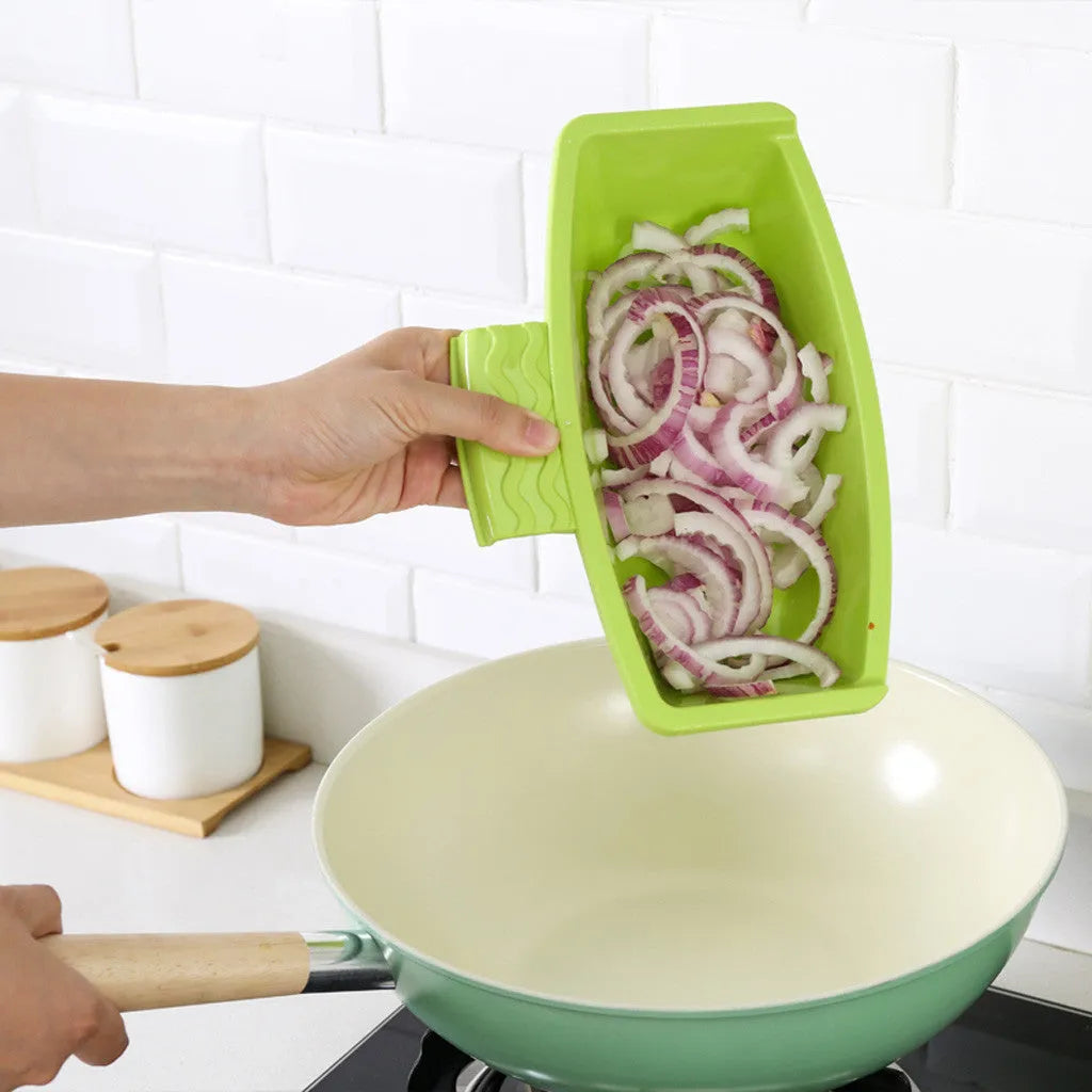 Green multi-function kitchen cutting board with integrated draining basket mounted on sink edge