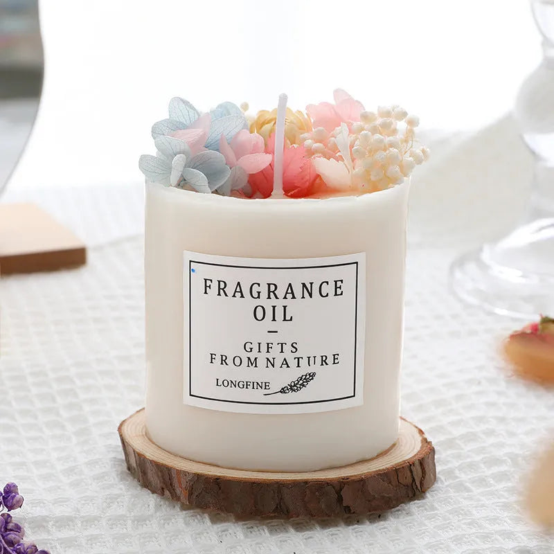Dried flower romantic scented candle in gift box with chip wood base.