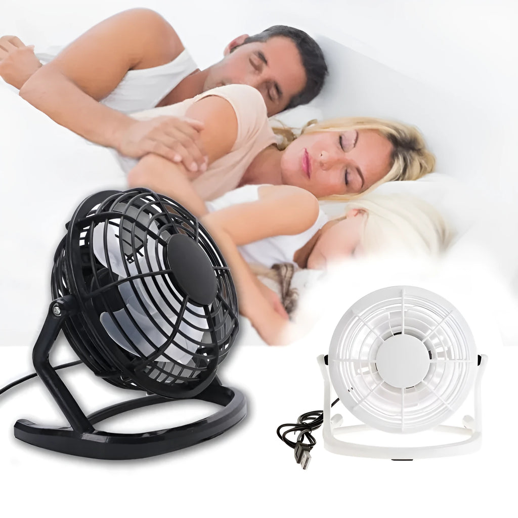 Mini adjustable USB desk fan in black, white, or blue on a workspace next to a laptop.