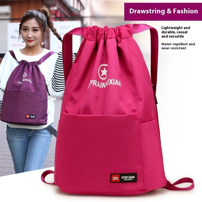 Solid colour drawstring backpack in Oxford cloth with water pillow belt system showing large and small size options
