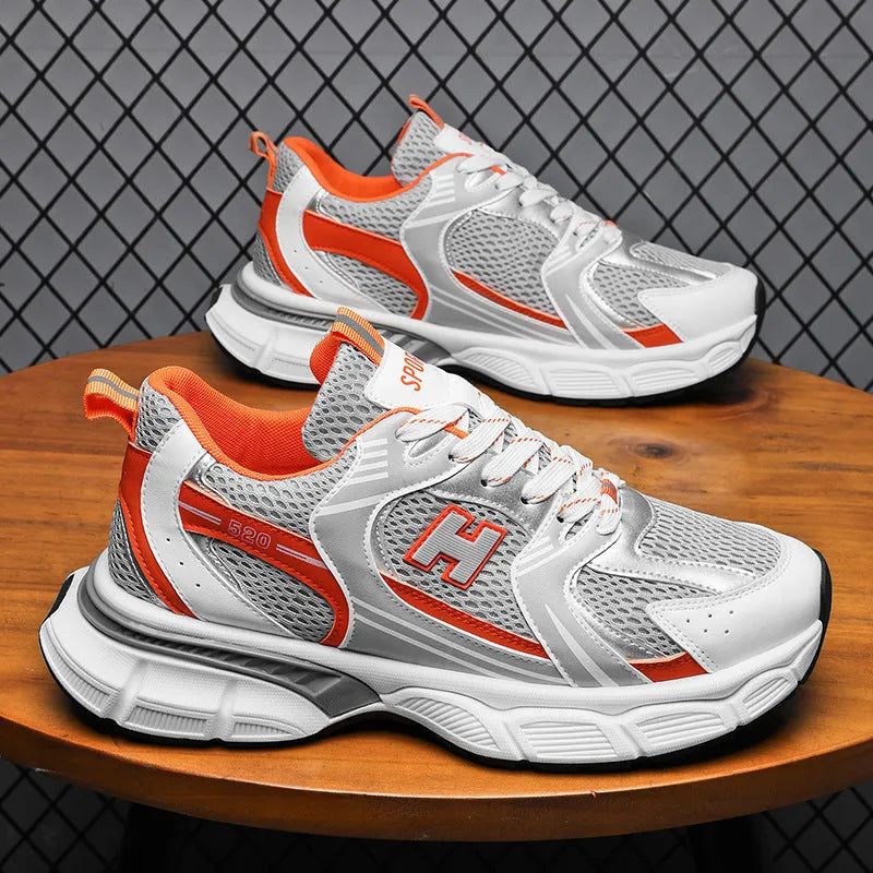 Men's mesh running shoes in black, white and grey, and white orange colours with plastic soles