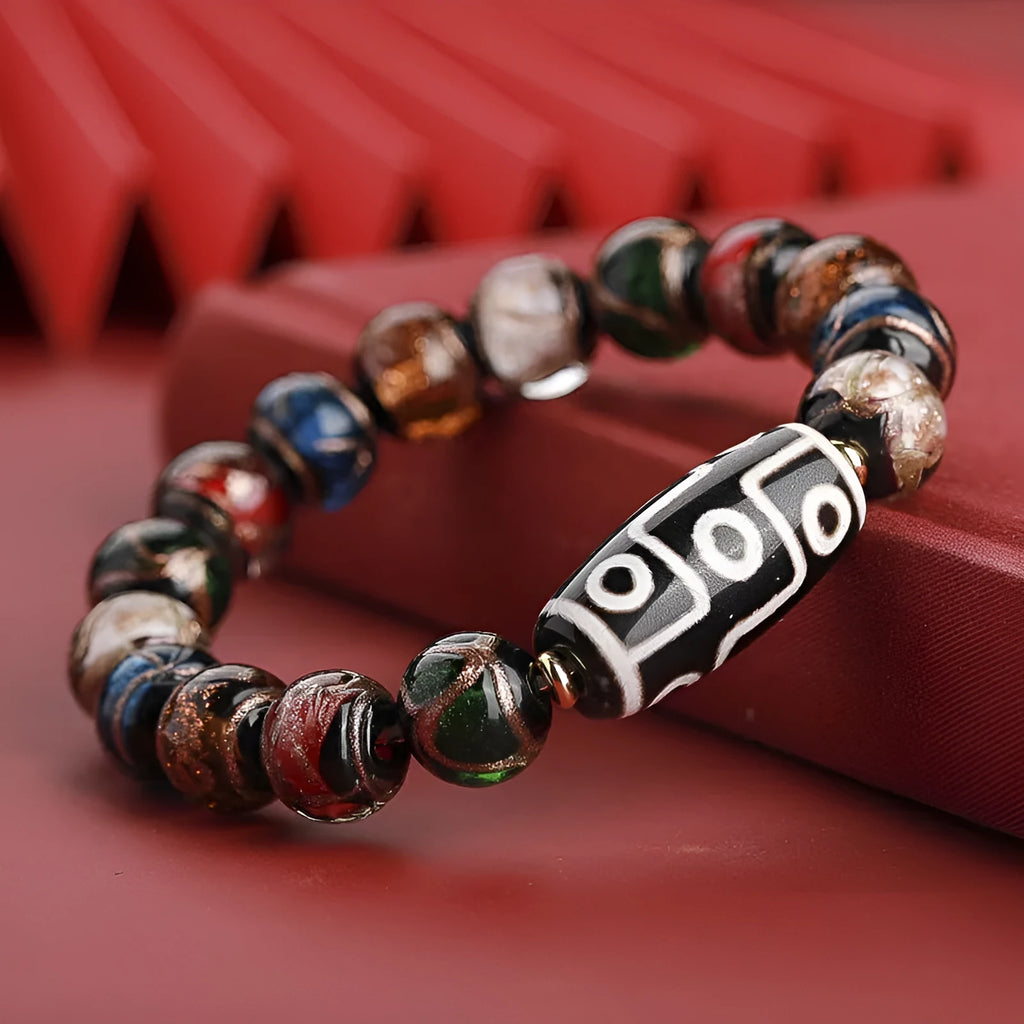 Chinese style coloured glaze bracelet with year snake lucky beads in three bead sizes